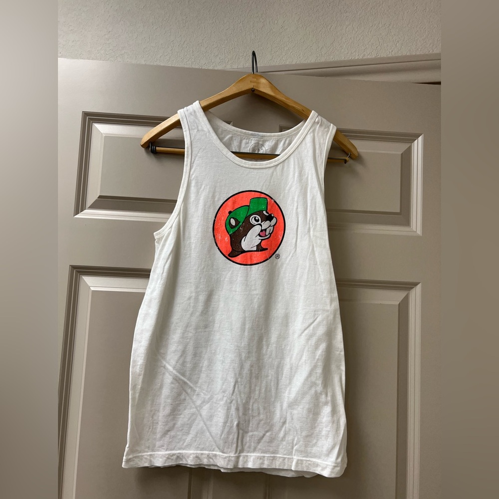 Small Bucees bro tank in white with a neon orange Bucee logo in the center.